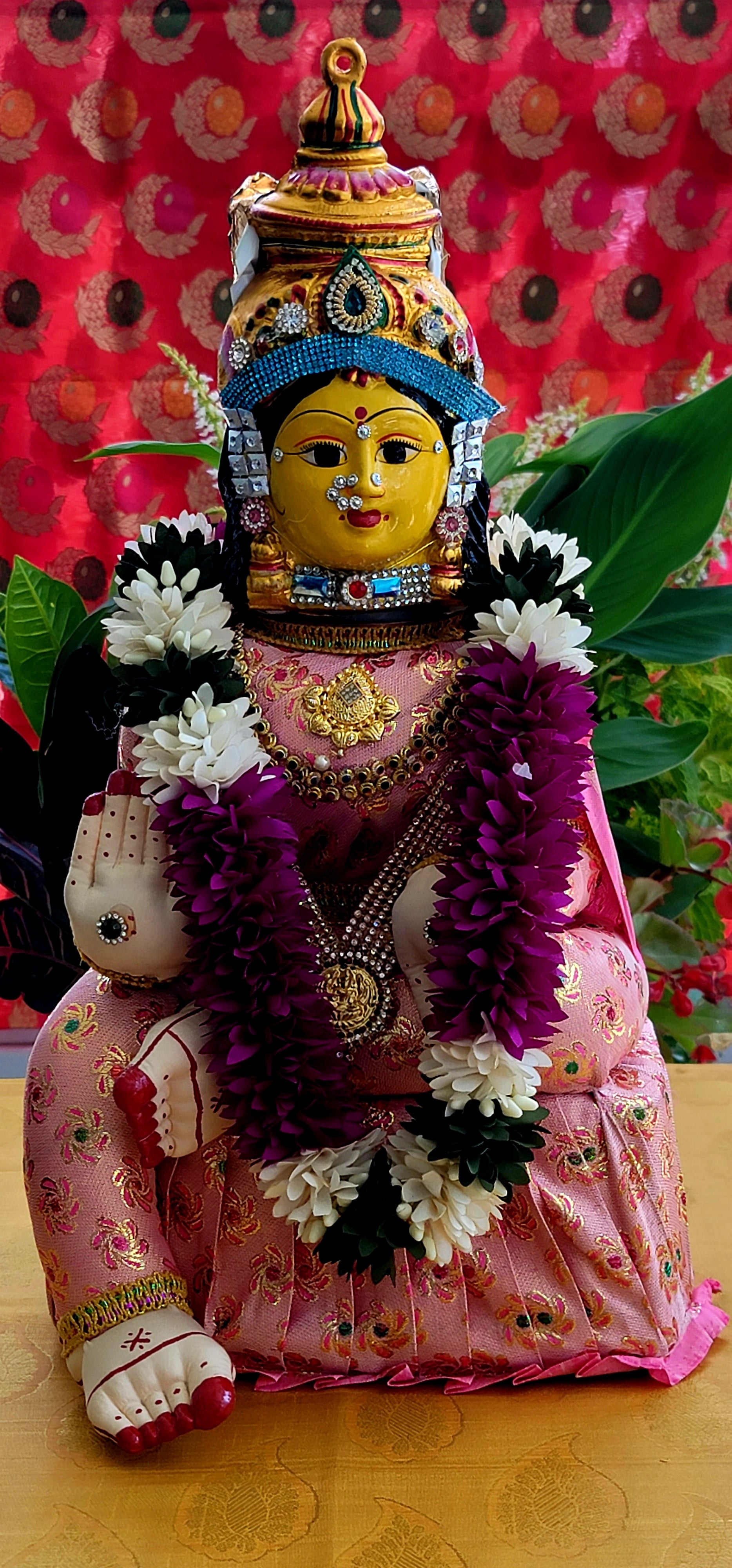 Image of Closeup of Goddess Lakshmi Statue Decoration during festival of Vara  Mahalakshmi Vrata. Its festival to propitiate the Goddess Lakshmi.  Varalakshmi is one who grants boons.-WM387034-Picxy